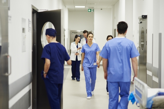Doctors and nurses in hospital corridor