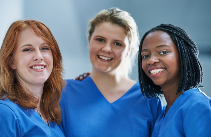 Group of female doctors smiling